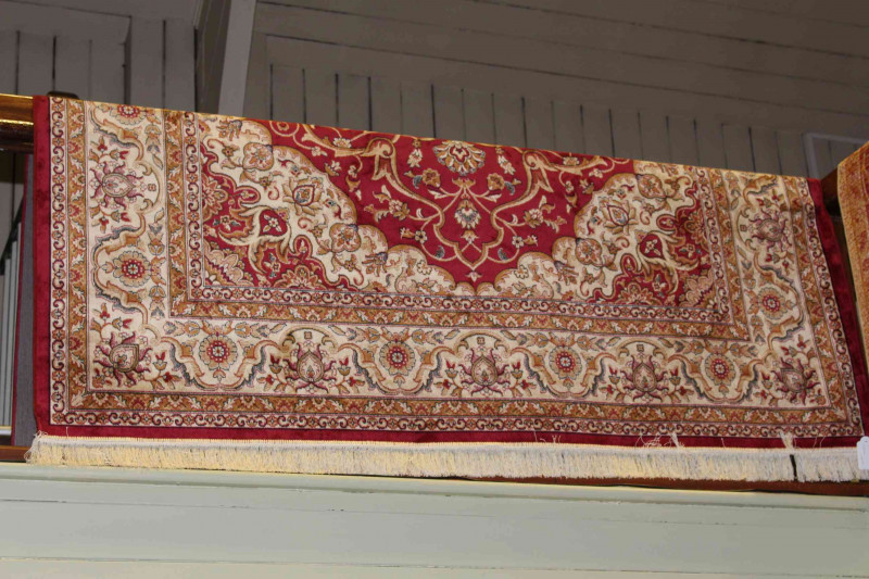 Keshan carpet with a red ground 2.80 by 2.00