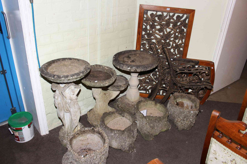 Four naturalistic tree trunk planters, three bird baths, patio table and two chairs (10)