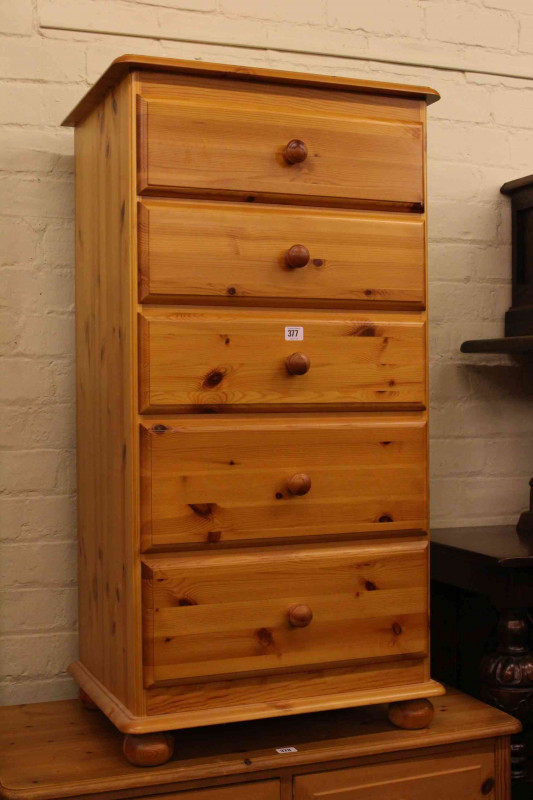Slim five drawer pine chest