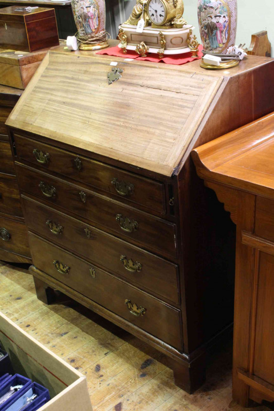 Georgian mahogany four drawer bureau on bracket feet, 107cm by 92cm