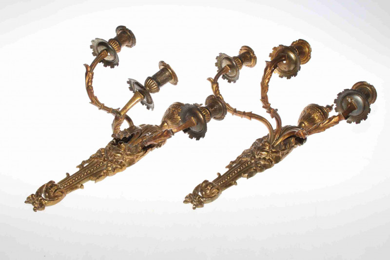 Pair of ornate three branch gilt metal wall sconces
