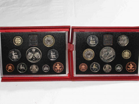 Two Royal Mint proof coin collections, in leather wallets, 1997 and 1998