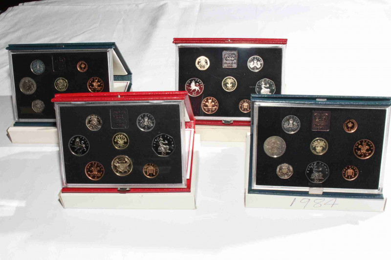 Four Royal Mint Proof coin sets, 1983, 1984, 1985 and 1986