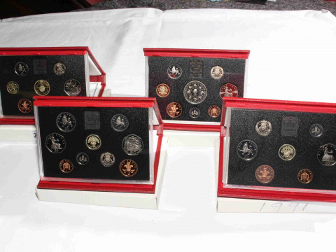 Four Royal Mint Proof coin sets, 1991, 1992, 1993 and 1994