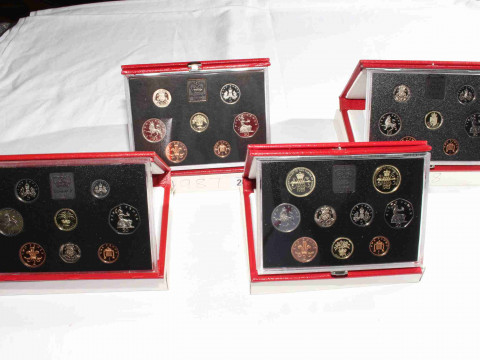 Four Royal Mint Proof coin sets, 1987, 1988, 1989 and 1990