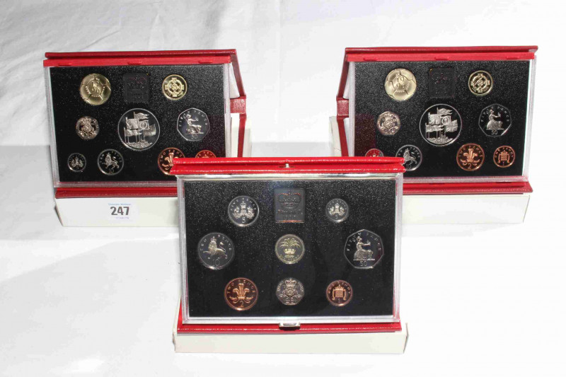 Three Royal Mint Proof coin sets, 1990 and 1996 (2)