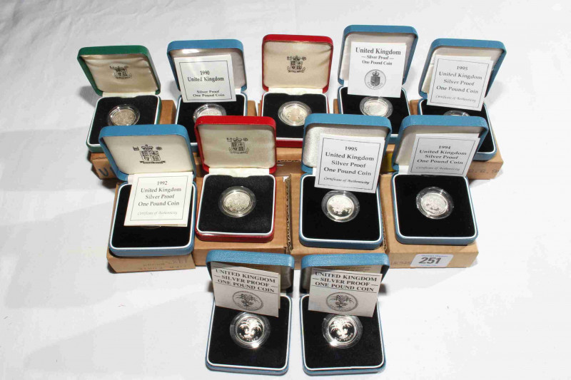 Eleven Royal Mint silver £1 proof coins
