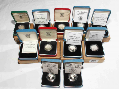 Eleven Royal Mint silver £1 proof coins