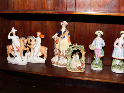 Two pairs of two single Staffordshire figures
