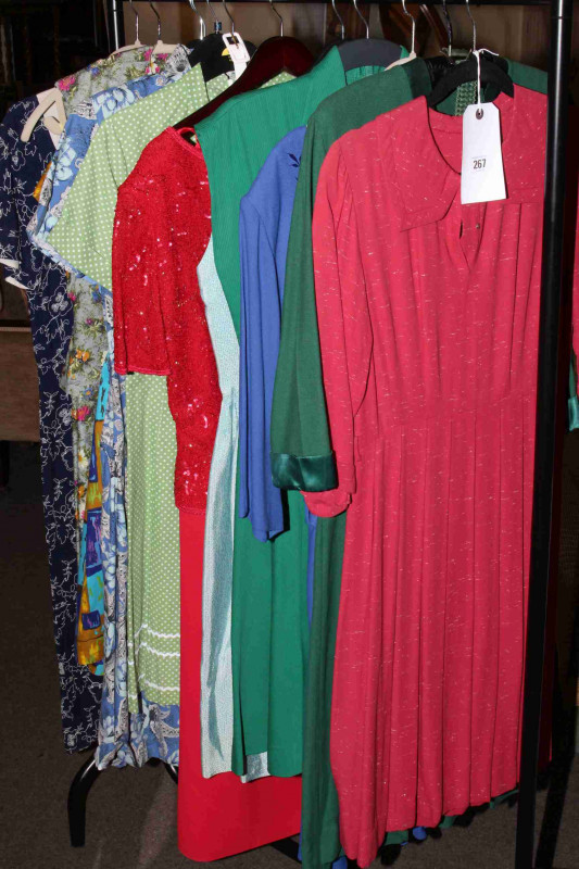 Twelve vintage dresses in various materials