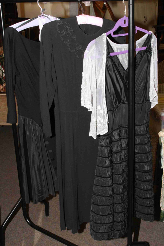 Three black evening dresses