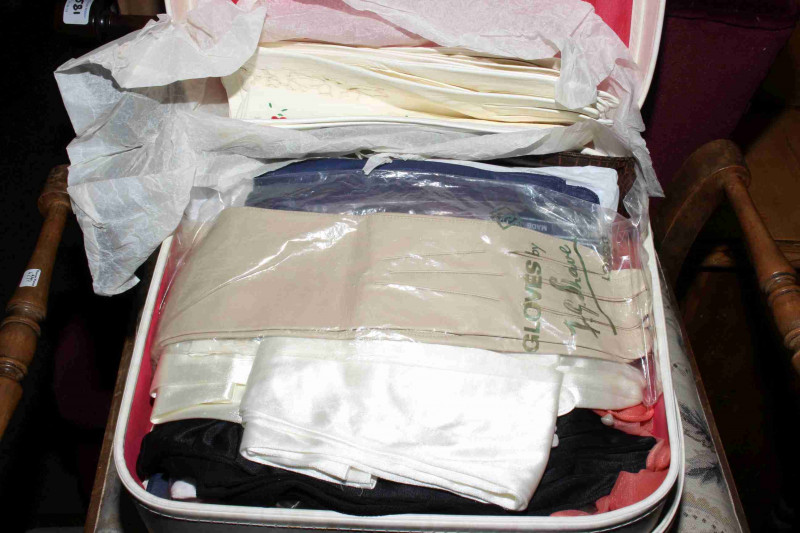 Vanity case containing large quantity of ladies gloves