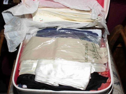 Vanity case containing large quantity of ladies gloves