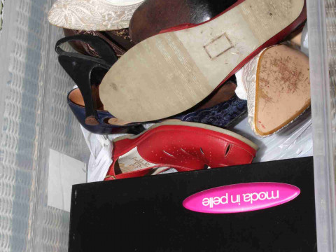 Box containing vintage and other shoes