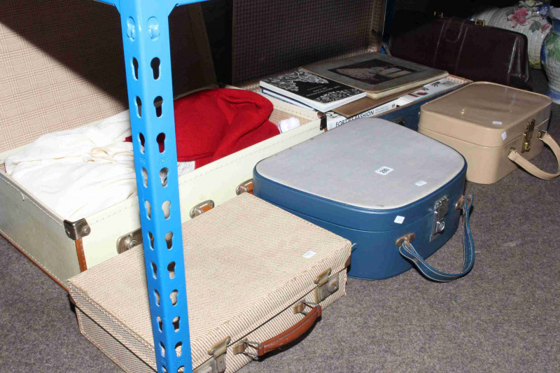 Suitcase of linen, two vanity cases, briefcase and books relating to vintage clothing