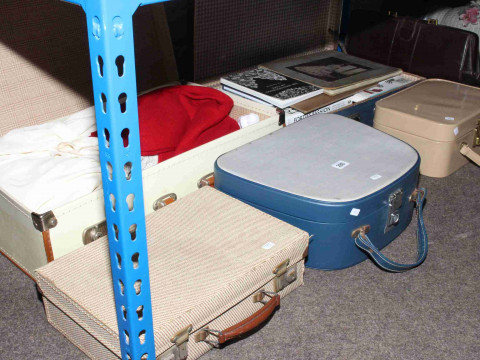 Suitcase of linen, two vanity cases, briefcase and books relating to vintage...