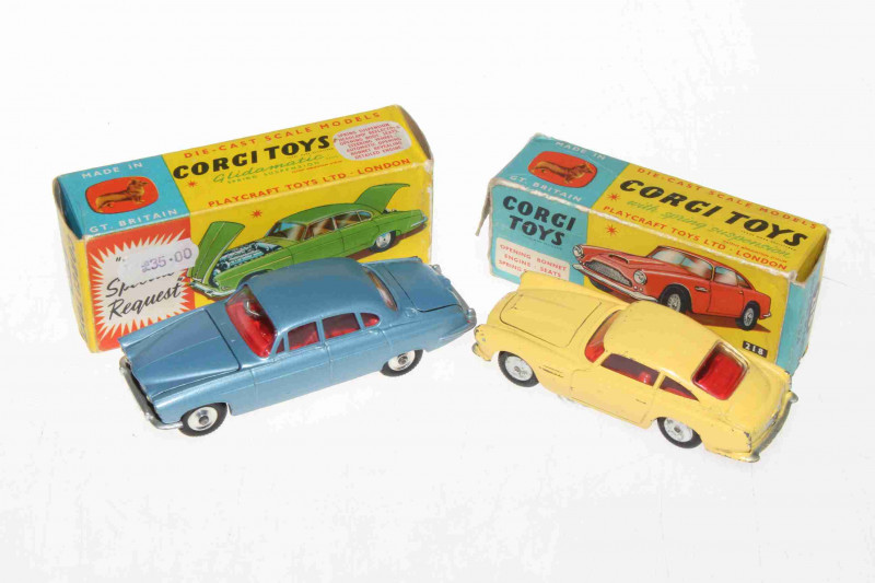 Two Corgi models, Aston Martin DB4 218 and Jaguar Mark X 238, with boxes