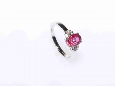 18 carat white gold, oval pink sapphire and baguette diamond ring, size...