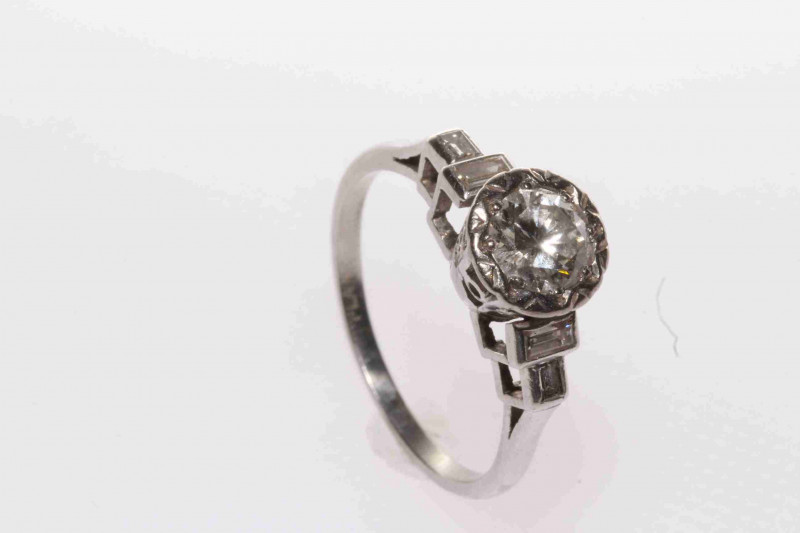 Vintage 1950's platinum, round brilliant diamond ring with baguette diamond shoulders, size N