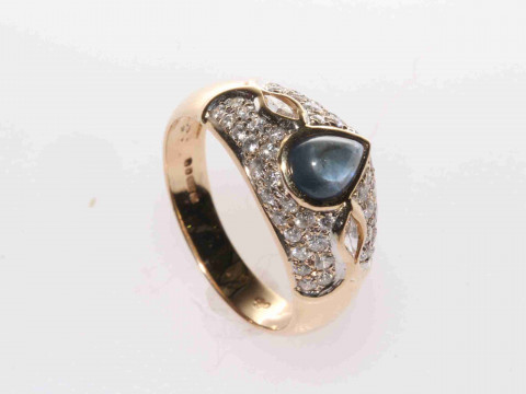 18 carat yellow gold, cabochon sapphire and pavé set diamond ring, size...