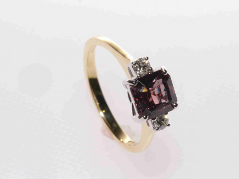 18 carat yellow gold fancy sapphire and round brilliant diamond three-stone...