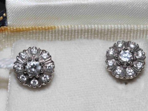 Pair of 18 carat gold and diamond stud earrings