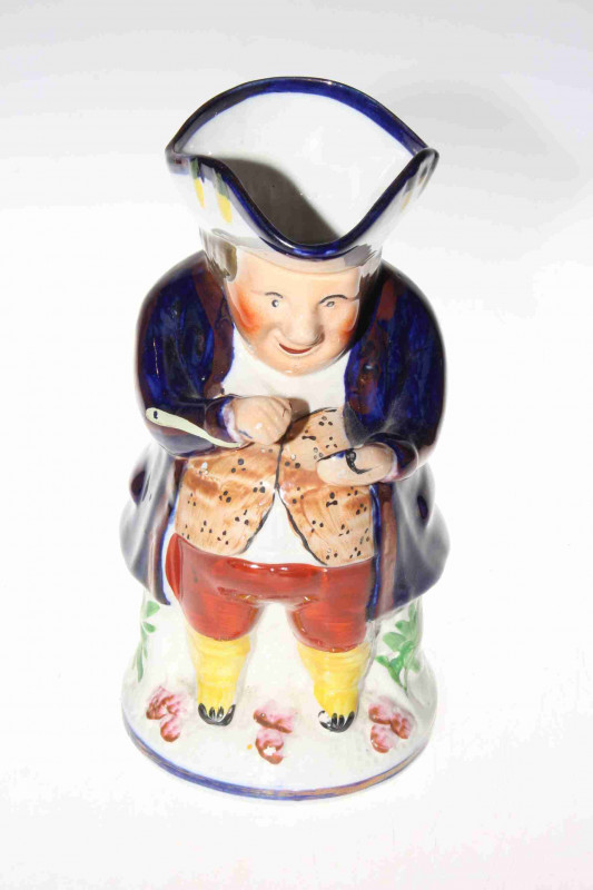 Staffordshire snuff taker toby jug