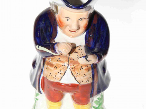 Staffordshire snuff taker toby jug