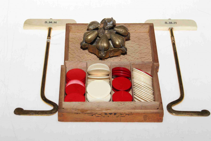 Ivory handled boot pulls, counters and brass box