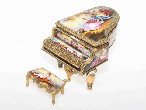 Ornate gilt metal and decorated panel of grand piano and stool musical...