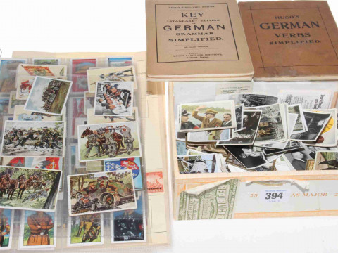 Collection of WWII Third Reich stamps, pictures ad cigarette cards