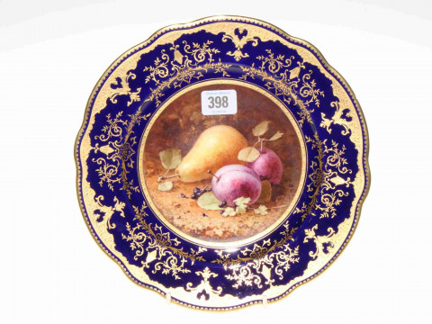 Coalport plate painted with fruit, signed F.H. Chivers, with gilt on blue...