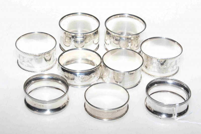Collection of nine silver napkin rings