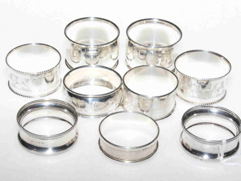 Collection of nine silver napkin rings