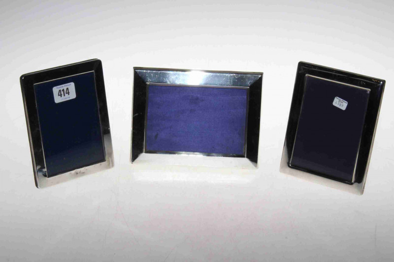 Three silver easel photograph frames