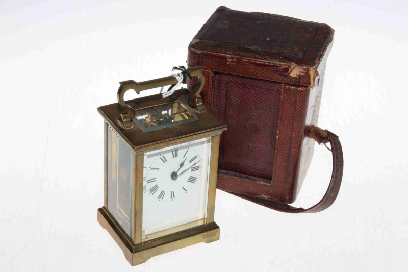 Gilt brass carriage clock, with key and case