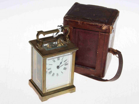 Gilt brass carriage clock, with key and case