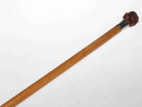 Silver mounted malacca cane with elephant carved handle
