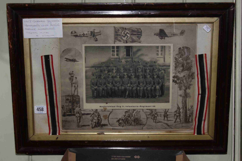 WWII German Regimental photograph and box containing uniform braid, shoulder pips, badges, etc
