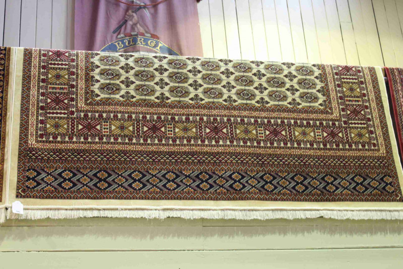 Bokhara carpet with a beige ground 2.80 by 2.00