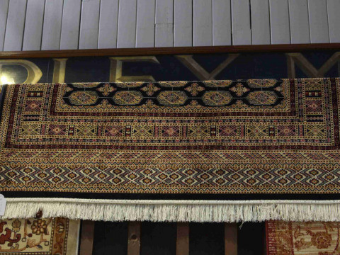 Bokhara rug with a blue ground 1.90 by 1.40
