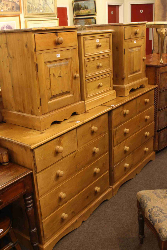Pair waxed pine five drawer chests, pair pine pedestals and pine three drawer pedestal chest (5)