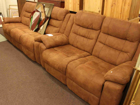 Pair of three seater and two seater reclining settees in brown fabric