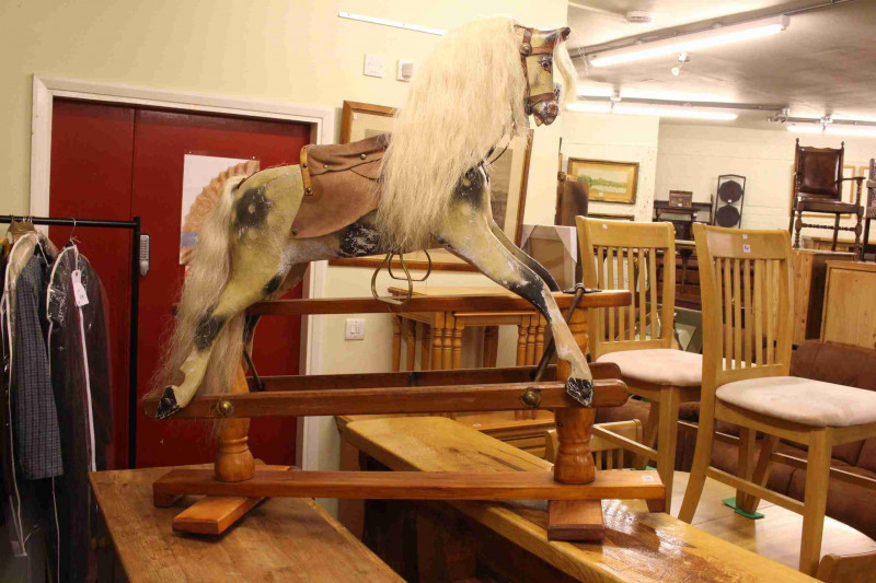 Sponge painted rocking horse on pine safety stand