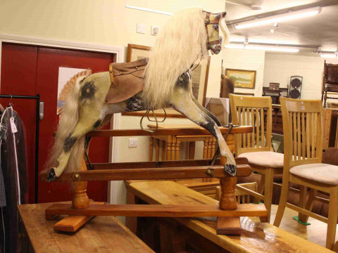 Sponge painted rocking horse on pine safety stand