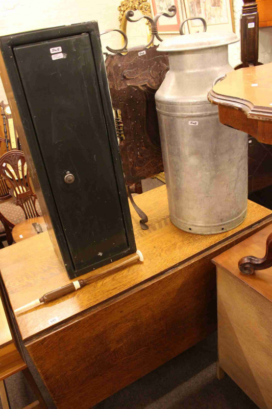 Oak drop leaf dining table, copper Arts & Crafts style firescreen, gun cabinet and keys and an aluminium milk churn (4)