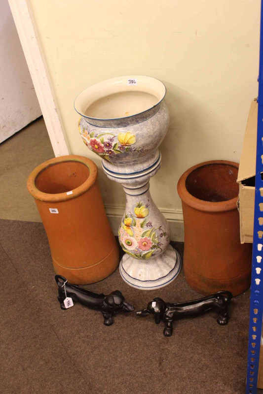 Pair terracotta chimney pots, jardiniere and stand and pair cast Dachshund foot scrapers