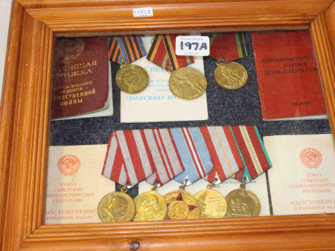 Russian medals, well presented with papers in a display case
