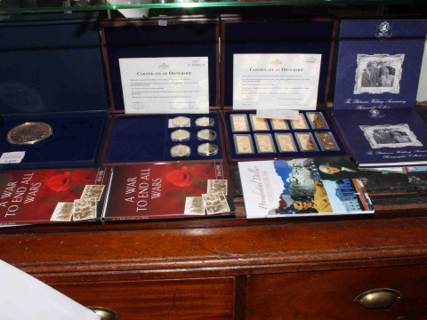 Collection of Mint coins, in albums/cases