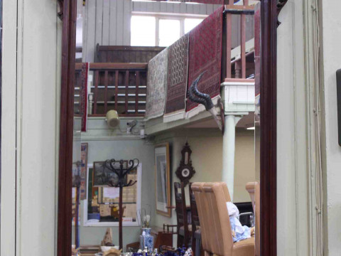 Mahogany framed rectangular bevelled wall mirror with scrolling swan neck...